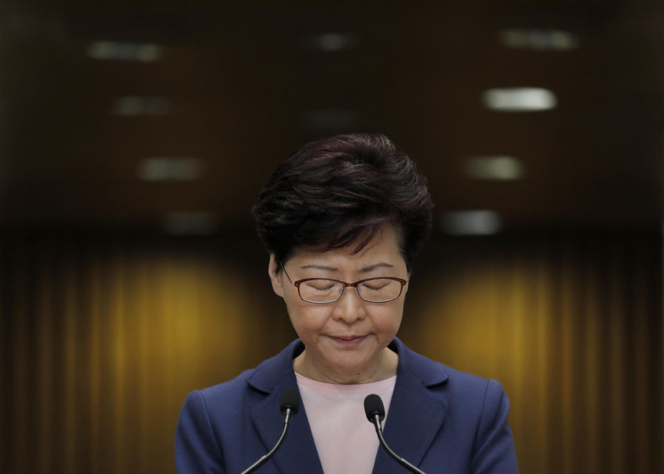 FILE - In this July 9, 2019, file photo, Hong Kong Chief Executive Carrie Lam pauses during a press conference in Hong Kong. Hong Kong's protest movement has reached a moment of reckoning after protesters occupying the airport held two mainland Chinese men captive, and pro-democracy lawmakers and fellow demonstrators question whether the whole operation has gone too far. (AP Photo/Vincent Yu, File)