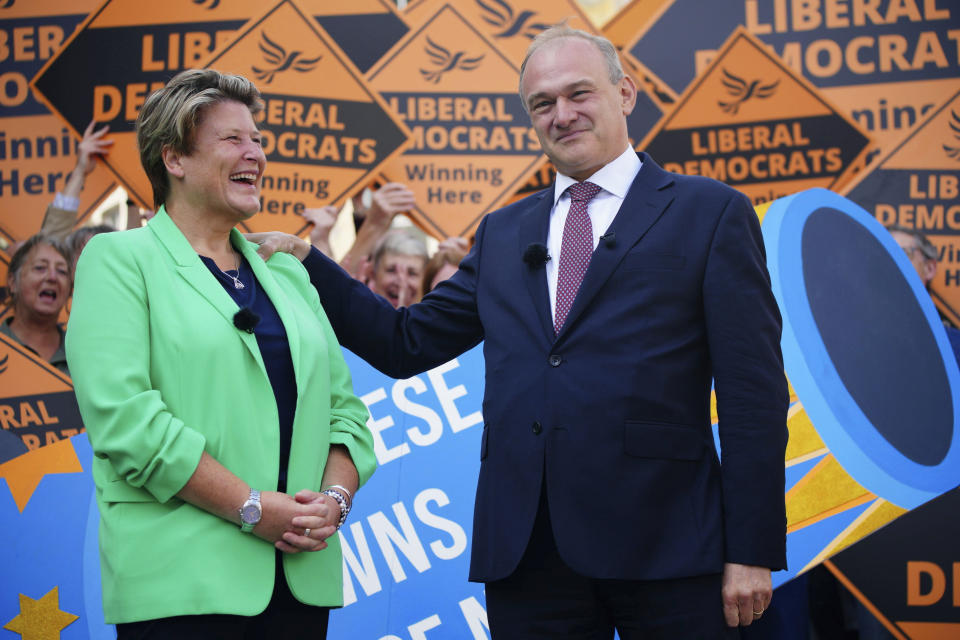 Britain's newly elected Liberal Democrat MP Sarah Dyke, left, is congratulated by party leader Ed Davey after she won the Somerton and Frome by-election, in Frome, Somerset, England, Friday, July 21, 2023. Britain’s governing Conservative Party has suffered two thumping defeats in a trio of special elections but avoided a drubbing after holding onto former premier Boris Johnson’s seat in suburban London. Though the main opposition Labour Party and the smaller centrist Liberal Democrats overturned massive Conservative majorities in Thursday's elections to win a seat apiece, the Conservatives found some crumbs of comfort in their narrow success in Uxbridge and South Ruislip in west London. (Ben Birchall/PA via AP)