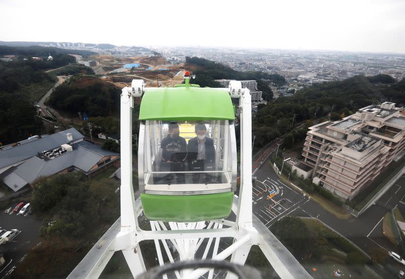 'Amusement Workation' let teleworkers work from a Ferris wheel and pool side amid the coronavirus disease (COVID-19) outbreak, at Yomiuriland in Tokyo