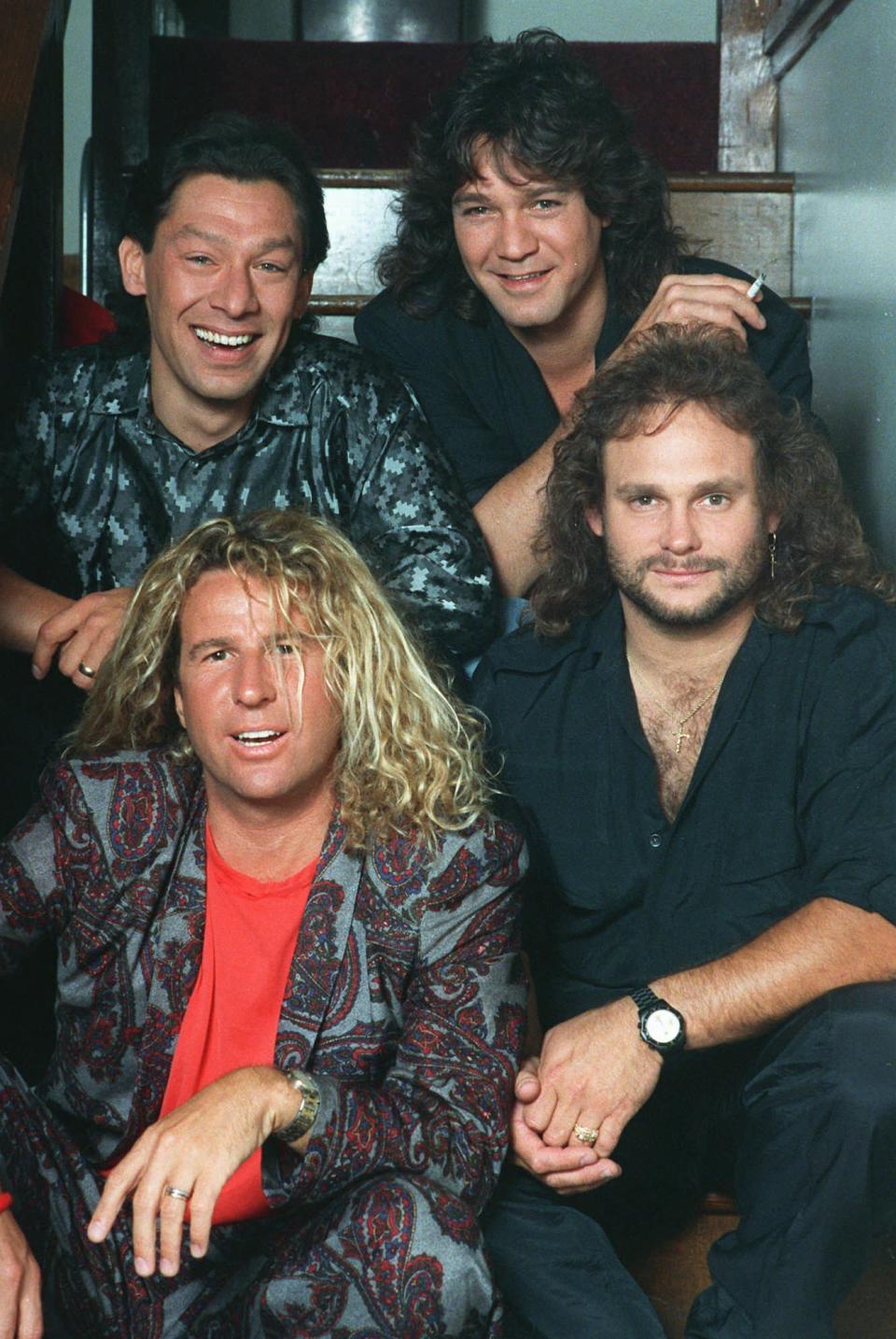 FILE- The rock group Van Halen, clockwise from left: Alex Van Halen, Eddie Van Halen, Michael Anthony and Sammy Hagar appear in a 1988 photo. Eddie Van Halen, who had battled cancer, died Tuesday, Oct. 6, 2020. He was 65. (AP Photo/File)