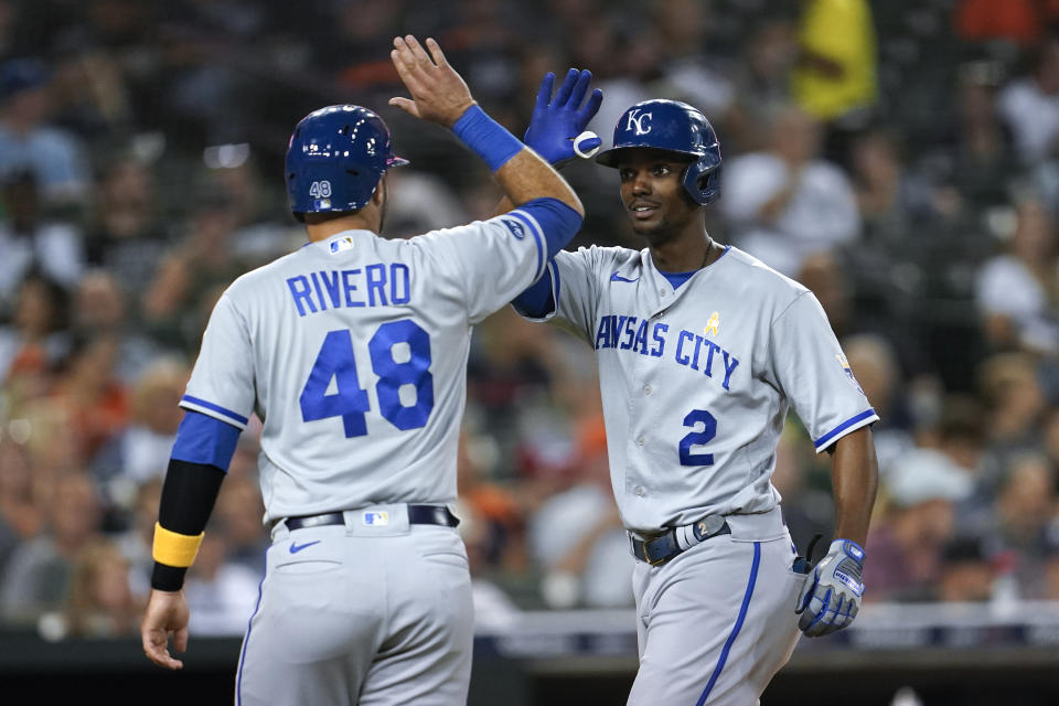 Kansas City Royals' Michael A. Taylor (2) celebrates his two-run home run with Sebastian Rivero (48) in the sixth inning of a baseball game against the Detroit Tigers in Detroit, Friday, Sept. 2, 2022. (AP Photo/Paul Sancya)