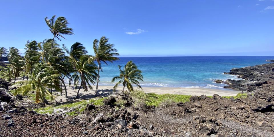 Pohue Bay on Hawaii's Big Island is pictured April 11, 2022. Hawaii Volcanoes National Park on the Big Island on Tuesday, July 12, 2022, was given new land in a deal that will protect and manage an ocean bay area that is home to endangered and endemic species and to rare, culturally significant Native Hawaiian artifacts. (Trust for Public Land via AP)