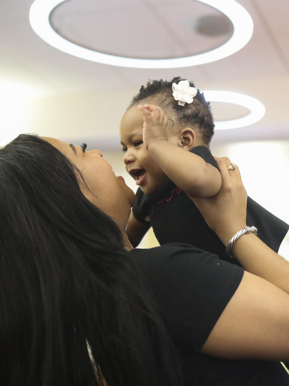 Giovanna Andrews with her daughter Isabella Harper Andrews, the namesake of Harper's Heart, the organization that Andrews started to help expectant or new mothers. She's pictured at the Thousand Bib and Book Giveaway event at the Wilmington Public Library in 2019.