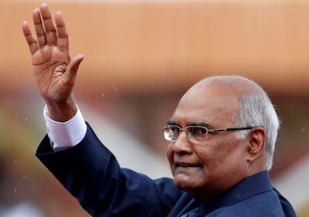 India's new President Ram Nath Kovind waves after being sworn in at the Rashtrapati Bhavan presidential palace in New Delhi, India July 25, 2017. REUTERS/Cathal McNaughton