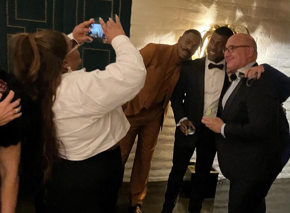 Da'Vine Joy Randolph steps in to take a photo of a fan with Colman Domingo in the lobby of the Parker Palm Springs after the Film Awards After Party on Thursday, Jan. 4, 2024.