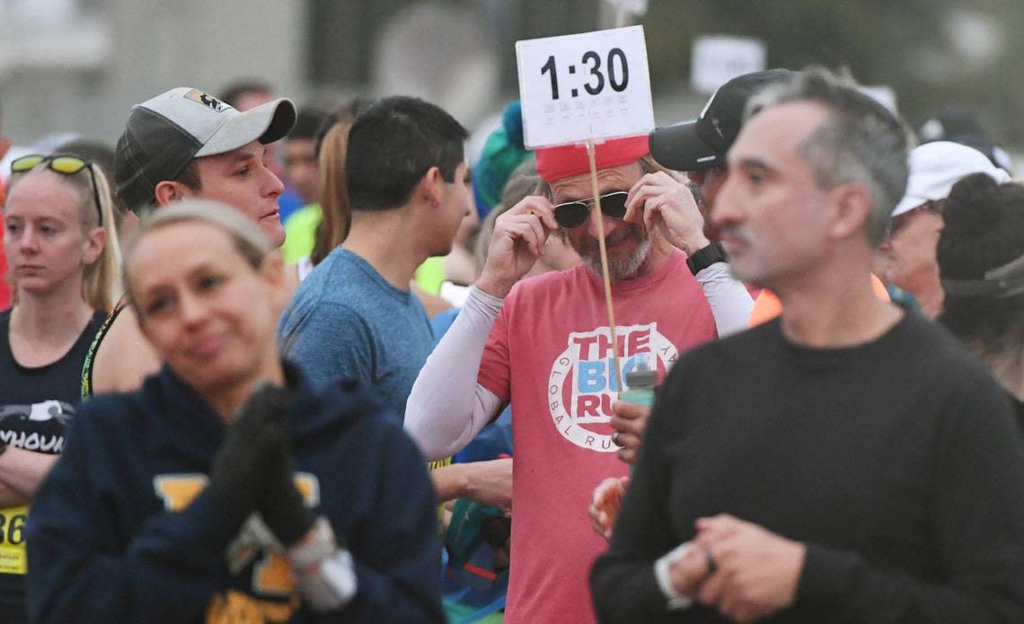 Alex Silverman from Oakhurst adjusts his glasses before starting the Half Marathon at the annual Two Cities Marathon on Sunday, Nov. 6, 2022, in Clovis.