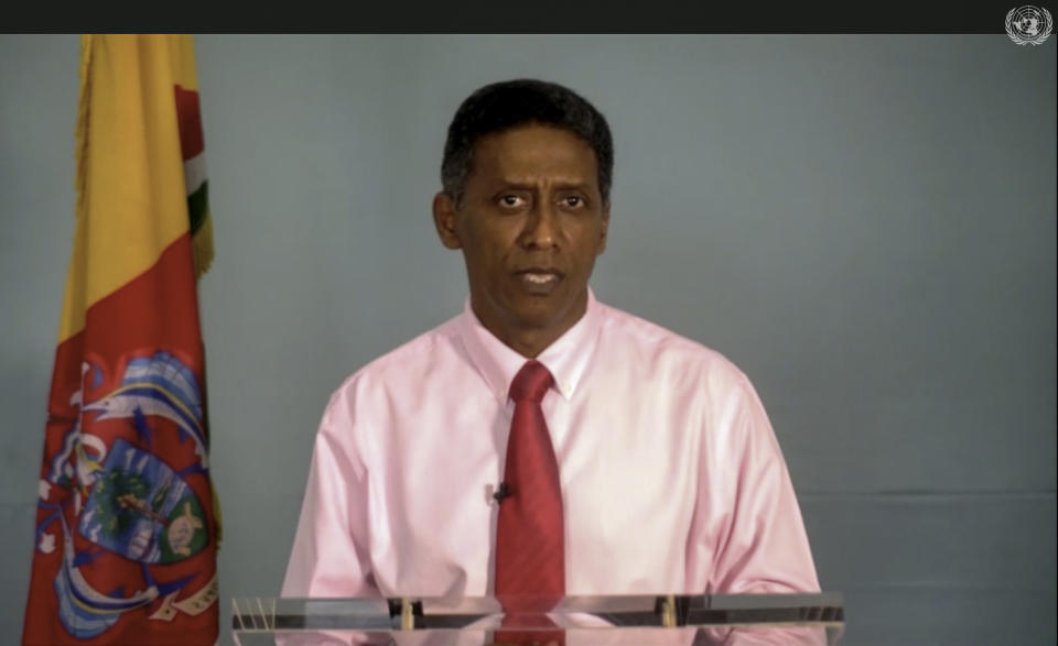 In this image made from UNTV video, Danny Faure, President of Seychelles, speaks in a pre-recorded message which was played during the 75th session of the United Nations General Assembly, Tuesday, Sept. 22, 2020, at UN headquarters in New York. The U.N.'s first virtual meeting of world leaders started Tuesday with pre-recorded speeches from some of the planet's biggest powers, kept at home by the coronavirus pandemic that will likely be a dominant theme at their video gathering this year. (UNTV via AP)