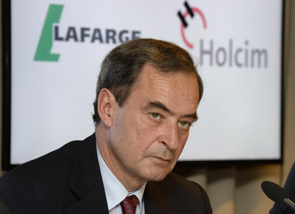 Bruno Lafont, future chairman of LafargeHolcim speaks at a news conference in Zurich, Switzerland, Monday, April 7, 2014. Swiss-based Holcim and its French counterpart, Lafarge, two of the world's largest suppliers of building materials announced plans for a "merger of equals" Monday that would create an industry giant with a combined 32 billion euros (US dollar 44 billion) in annual revenues. (AP Photo/Keystone, Steffen Schmidt)