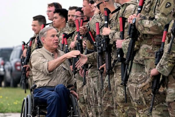 PHOTO: FILE - Texas Gov. Greg Abbott shakes hands with members of the Texas National Guard as they prepare to deploy to the Texas-Mexico border in Austin, Texas, May 8, 2023. (Eric Gay/AP, FILE)