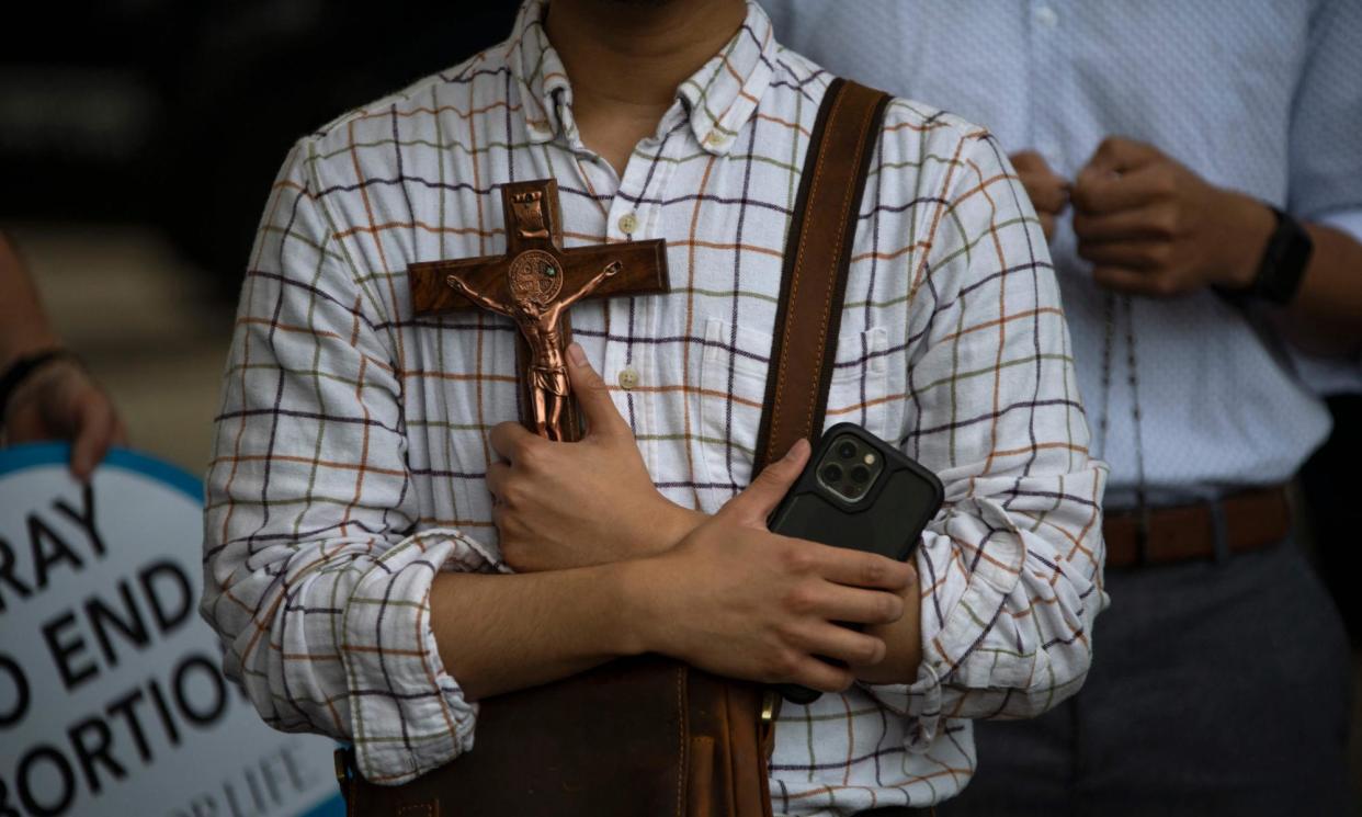 <span>Protesters outside city hall in Houston, Texas, during a Bans Off Our Bodies rally on 14 May 2022.</span><span>Photograph: Mark Felix/AFP/Getty Images</span>