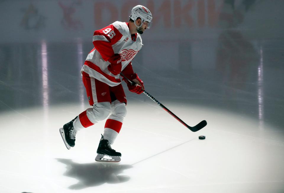 Detroit Red Wings center Andrew Copp (18) takes the ice to warm up before the game against the Pittsburgh Penguins at PPG Paints Arena in Pittsburgh on Sunday, March 17, 2024.