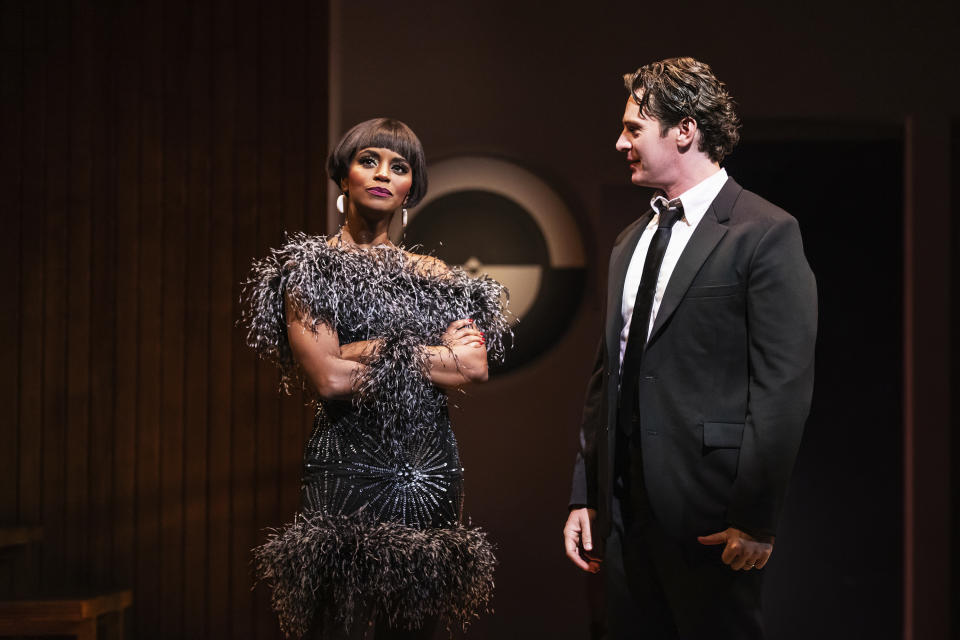 This image released by Polk & Co. shows Krystal Joy Brown, left, and Jonathan Groff during a performance of the revival of Stephen Sondheim’s “Merrily We Roll Along.” (Matthew Murphy/Polk & Co. via AP)