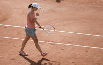 Poland's Iga Swiatek ccelebrates after defeating Estonia's Anett Kontaveit during their third round match on day 7, of the French Open tennis tournament at Roland Garros in Paris, France, Saturday, June 5, 2021. (AP Photo/Thibault Camus)