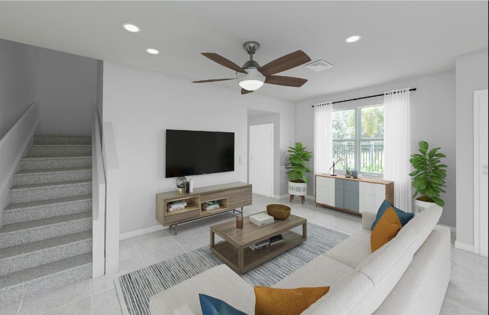 A rendering of a living room design for a home in the new Everton community by Pulte on 27 acres west of Lantana on South Military Trail.