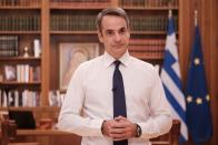 Greek Prime Minister Kyriakos Mitsotakis announces new coronavirus disease (COVID-19) related restrictions at Maximos mansion in Athens