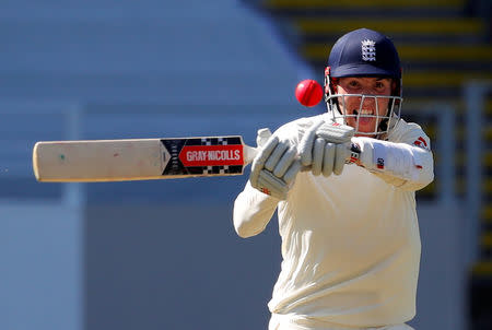 Cricket - Test Match - New Zealand v England - Eden Park, Auckland, New Zealand, March 22, 2018. England's Craig Overton prepares to hit a shot during the first day of the first cricket test match. REUTERS/David Gray