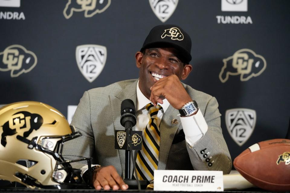 FILE - Deion Sanders speaks after being introduced as the new head football coach at the University of Colorado during a news conference Sunday, Dec. 4, 2022, in Boulder, Colo. The University of Colorado introduced a pilot program that makes the credit review for transfer students a more seamless process. It may have been the move that ultimately lured Deion "Coach Prime" Sanders to Boulder. (AP Photo/David Zalubowski, File)