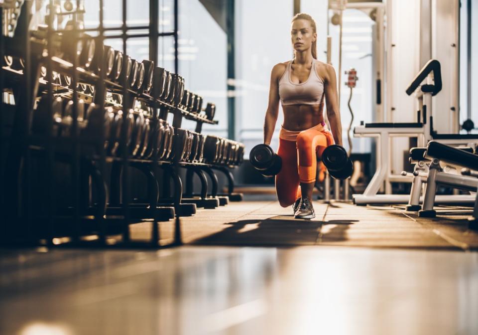 In a lunge, one knee should hover above the floor while the other should be at a 90-degree angle stacked above your ankle while you maintain proper posture. Getty Images