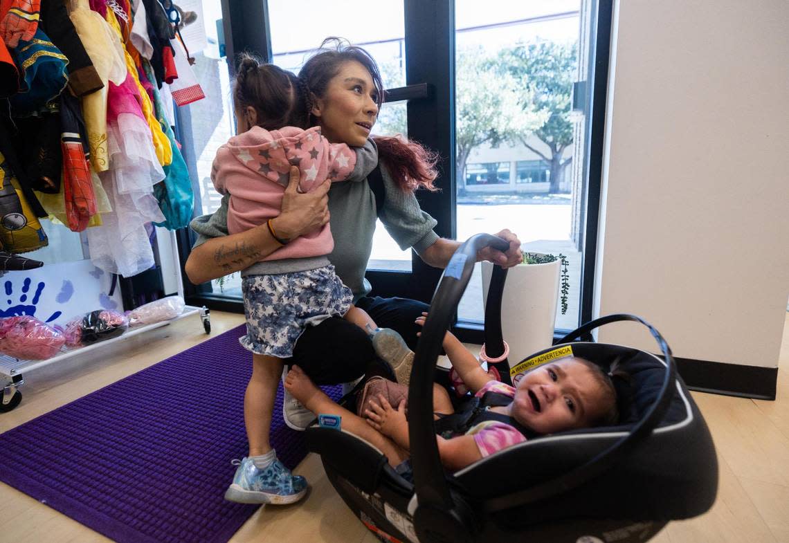 AmandaLyn Rodriguez, 3, hugs her mother Alexandrea Ruiz as she is dropped off at Annie’s Place in October. Ruiz, who is being treated for cervical cancer, often missed medical appointments before finding Annie’s Place.