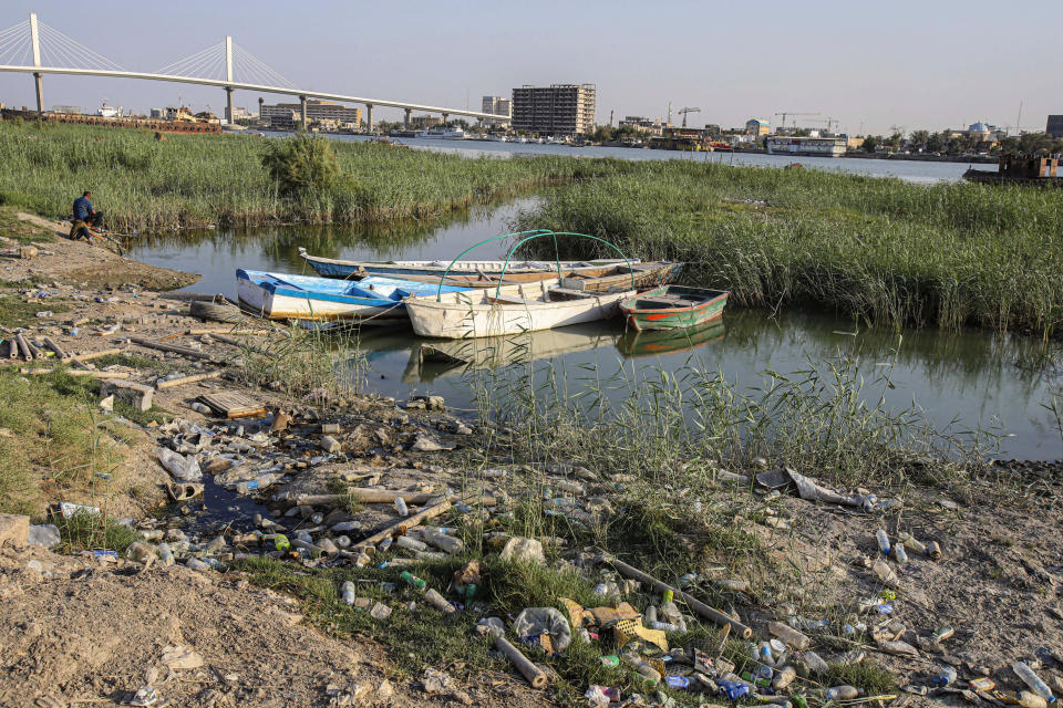 FILE - Fishing boats sit in the Shatt al-Arab waterway in Basra, Iraq on July 13, 2020. The three-year drought that has left millions of people in Syria, Iraq and Iran with little water wouldn’t have happened without human-caused climate change, according to a new study on Wednesday, Nov. 8, 2023. (AP Photo/Nabil al-Jurani, File)