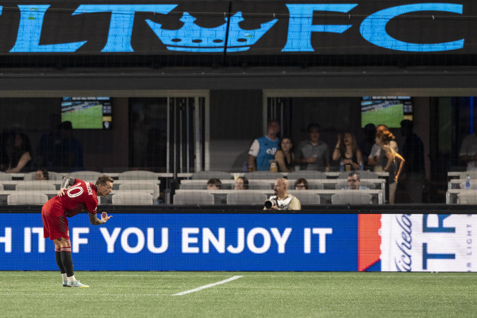 Toronto FC midfielder Alejandro Pozuelo (10) takes a bow after scoring a goal during the second half of an MLS soccer match against Charlotte FC, Saturday, Aug. 27, 2022, in Charlotte, N.C. (AP Photo/Matt Kelley)