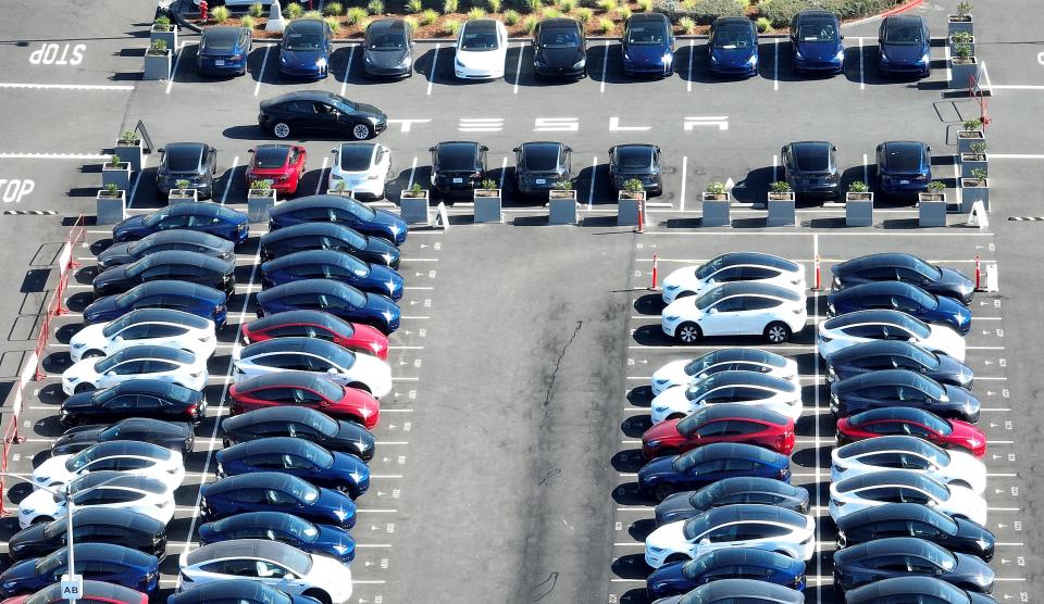 Tesla vehicles in a parking lot