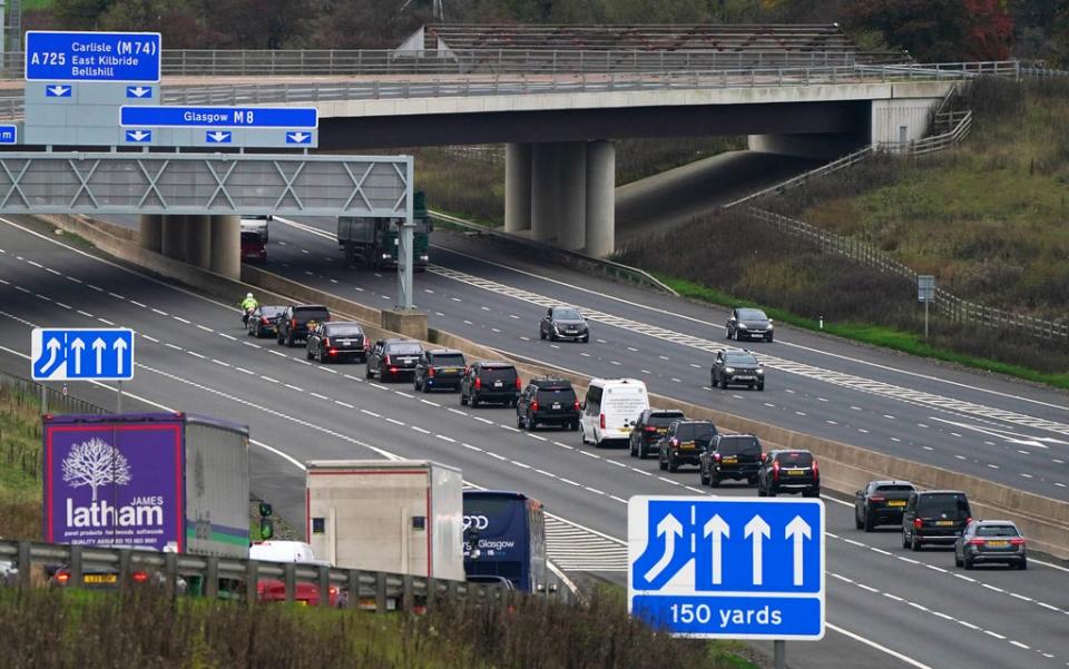 The president’s motorcade makes its way from Edinburgh to the Glasgow climate summit on Monday (PA)