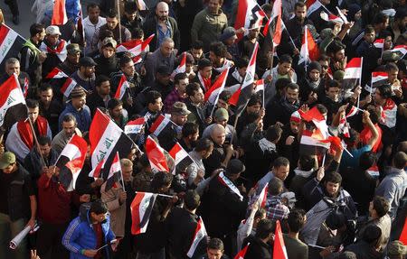 Protesters shout slogans during a demonstration against Turkish military deployment in Iraq, at Tahrir Square in central Baghdad, Iraq, December 12, 2015. REUTERS/Ahmed Saad