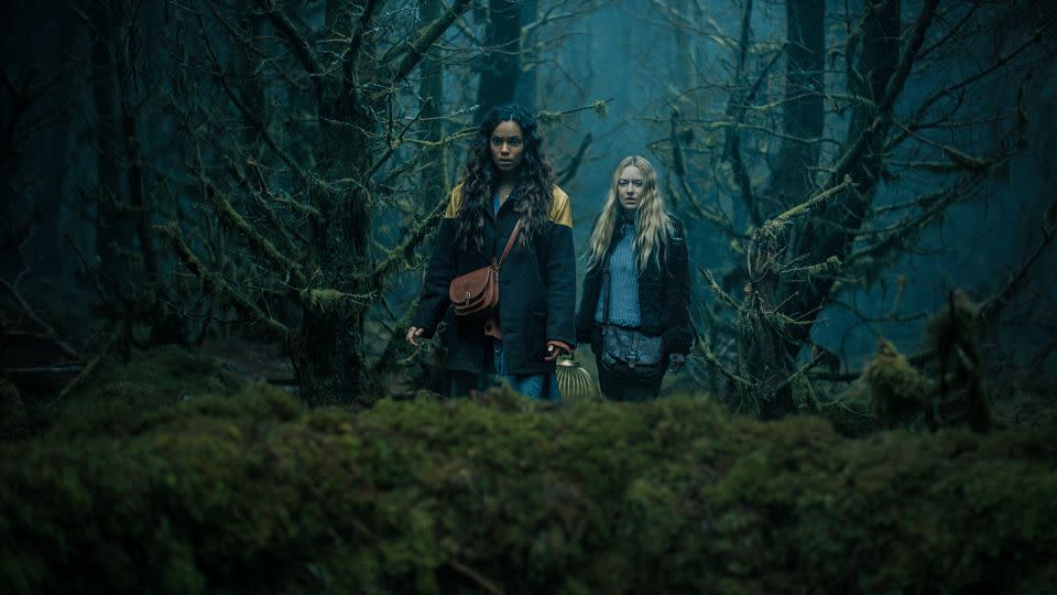 Georgina Campbell and Dakota Fanning in "The Watchers." - Courtesy Warner Bros. Pictures