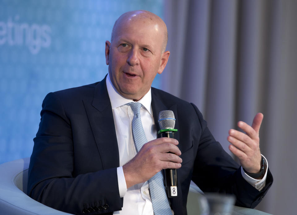 FILE - In this Oct. 18, 2019 file photo, Chairman and CEO of Goldman Sachs David Solomon speaks during the World Bank/IMF Annual Meetings in Washington. New York's governor says he is "appalled" by videos showing crowds standing close together at a Hamptons concert featuring electronic music duo The Chainsmokers over the weekend. Gov. Andrew Cuomo said the state Department of Health will conduct an investigation into "egregious social distancing violations." The Saturday night concert on July 25, 2020, was billed as a charity drive-in show called "Safe & Sound" where Solomon and the Southampton town supervisor also performed. (AP Photo/Jose Luis Magana, File)