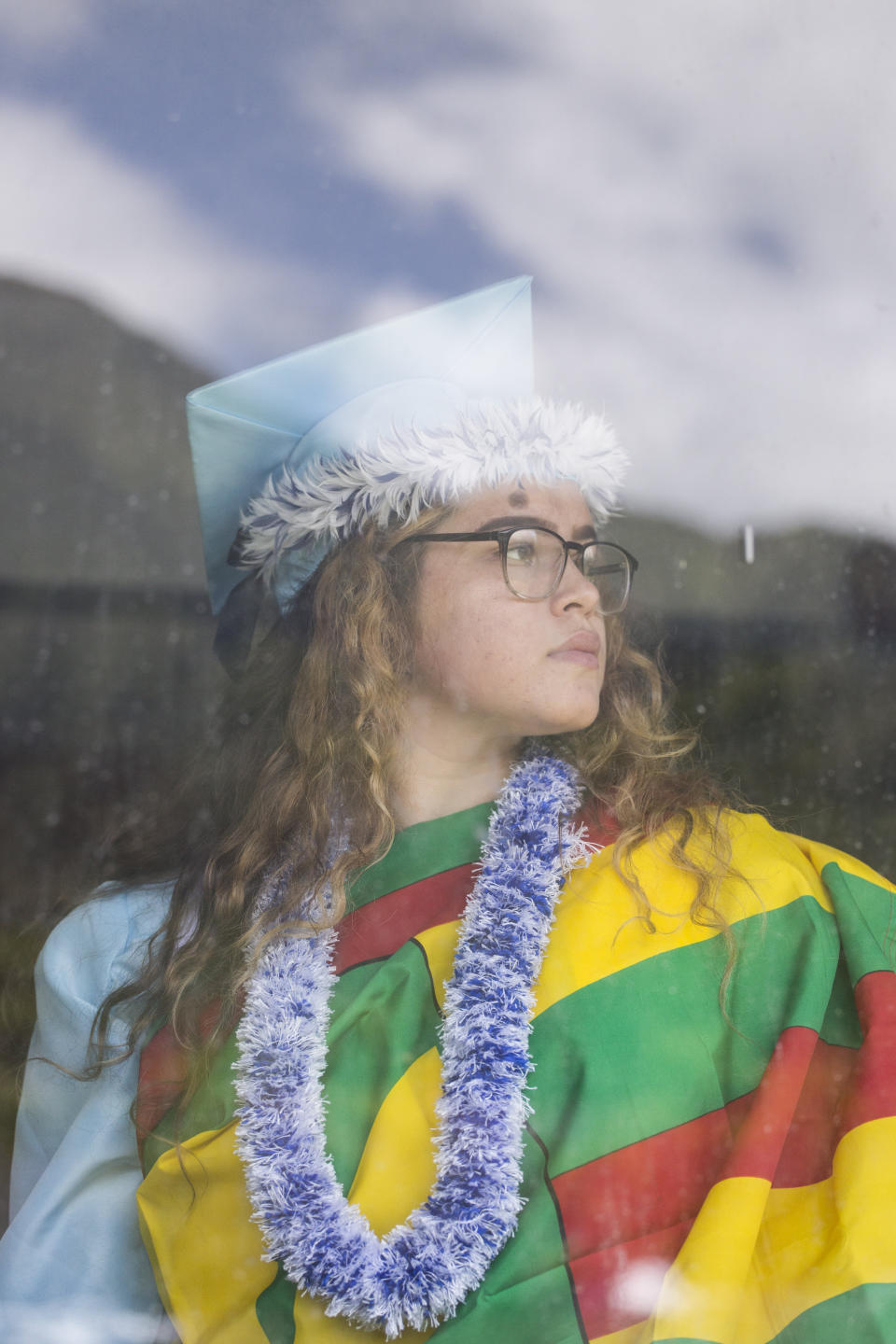 Kealoha Charles, a Kailua High School graduate, was planning to wear the Kānaka Maoli flag, or native Hawaiian flag. (Photo: Marie Eriel Hobro for HuffPost)