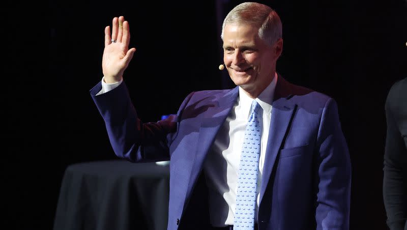 Elder David A. Bednar of Quorum of the Twelve Apostles of The Church of Jesus Christ of Latter-day Saints, waves to attendees at the eighth annual Silicon Slopes Summit at the Delta Center in Salt Lake City on Sept. 28, 2023.