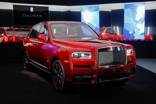 A Rolls-Royce Cullinan sport utility vehicle (SUV) stands on display during its media launch at Rolls-Royce Motor Cars Ltd. headquarters in Chichester, U.K. Named after the largest diamond discovered to date, the $325,000 vehicle is the latest in a long line of six-figure big rigs from the world’s most prestigious automakers. Photographer: Luke MacGregor/Bloomberg