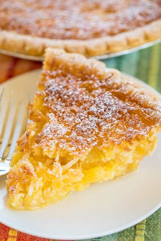 <p>Plain Chicken</p><p>This pineapple coconut chess pie can be served warm or cold.</p><p><strong>Get the recipe: <a href="https://www.plainchicken.com/pineapple-pie/" rel="nofollow noopener" target="_blank" data-ylk="slk:Pineapple Pie;elm:context_link;itc:0;sec:content-canvas" class="link rapid-noclick-resp">Pineapple Pie</a></strong></p>