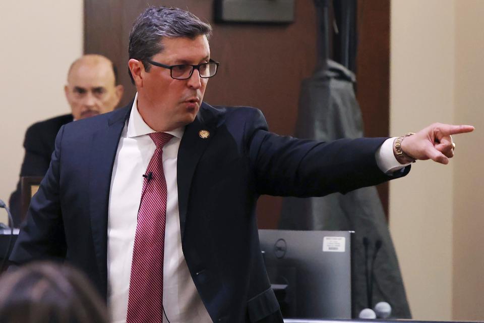 Webb County District Attorney Isidro Alaniz points to the defendant, former U.S. Border Patrol supervisor Juan David Ortiz, during trial Monday, Nov. 28, 2022.