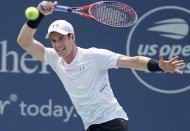 Andy Murray, of Great Britain, returns to Lucas Pouille, of France, in the first round at the Western & Southern Open, Monday, Aug. 13, 2018, in Mason, Ohio. (AP Photo/John Minchillo)