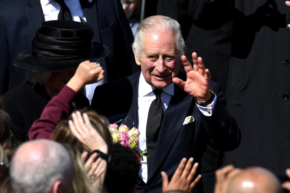 Britain's King Charles III waves as he arrives to visit Cardiff Castle (Getty Images)