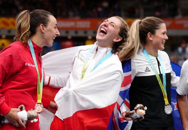 Dame Laura Kenny, centre, enjoys a joke on the podium after winning gold in the women’s 10km scratch at the Commonwealth Games. The 30-year-old subsequently revealed she had gone to bed the night before wondering if it would be her last competitive ride. The five-time Olympic champion endured a traumatic period following last year's Tokyo Games, suffering a miscarriage and an ectopic pregnancy. A late burst of speed saw her home, with New Zealand’s Michaela Drummond, right, being forced to settle for silver and Canada’s Maggie Coles-Lyster, left, clinching bronze