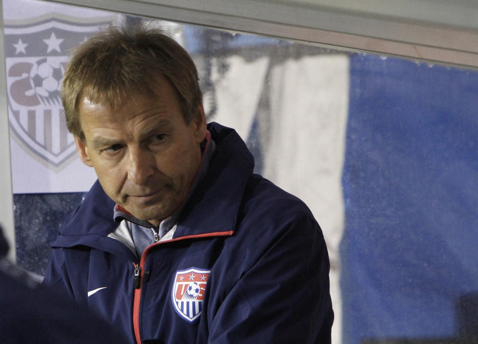 Germans' Juergen Klismann, coach of the U.S. soccer team, is seen during an international friendly match against Ukraine at Antonis Papadopoulos stadium in southern city of Larnaca, Cyprus, Wednesday, March 5, 2014. The Ukrainians are to face the United States in a friendly on Wednesday in Cyprus, a match moved from Kharkiv to Larnaca for security reasons. (AP Photo/Petros Karadjias)