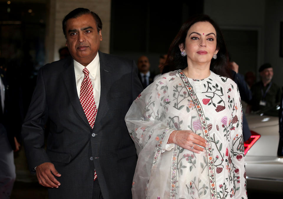 Mukesh Ambani, Chairman and Managing Director of Reliance Industries, arrives with his wife Nita Ambani to address the company's annual general meeting in Mumbai, India July 5, 2018. REUTERS/Francis Mascarenhas