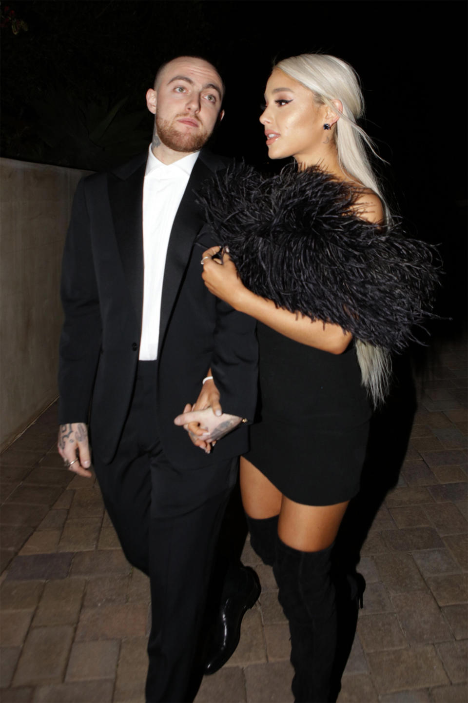 Rapper Mac Miller and singer Ariana Grande are seen attending an Oscar party in March. (Photo: GC Images via Getty Images)