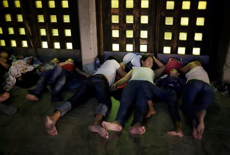 Central American migrants who returned to Mexico from the U.S. sleep outside the Our Lady of Guadalupe Cathedral in Ciudad Juarez