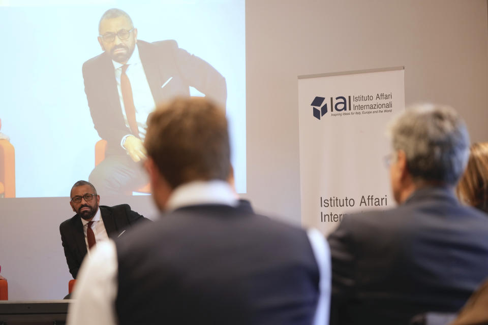 Britain's Home Secretary, James Cleverly attends "Migration, a global challenge", a talk at Rome's International Affairs Institute (IAI), Tuesday, Apr. 23, 2024. Cleverly is visiting Italy as part of the U.K. government's efforts to crack down on migrants arriving by small boats. After meeting with Italian Interior Minister Matteo Piantedosi tomorrow, Cleverly will also visit Lampedusa, the southernmost island of Italy which receives the majority of migrants arriving in the country. The visit comes as British Prime Minister Rishi Sunak stepped up his calls for the U.K. Parliament to approve his plan to deport some asylum-seekers to Rwanda. (AP Photo/Domenico Stinellis)