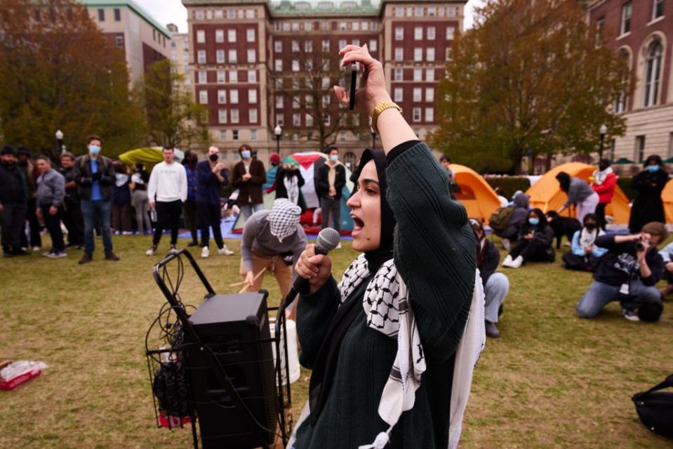 A demonstrator on the lawn at Columbia on Monday. James Keivom