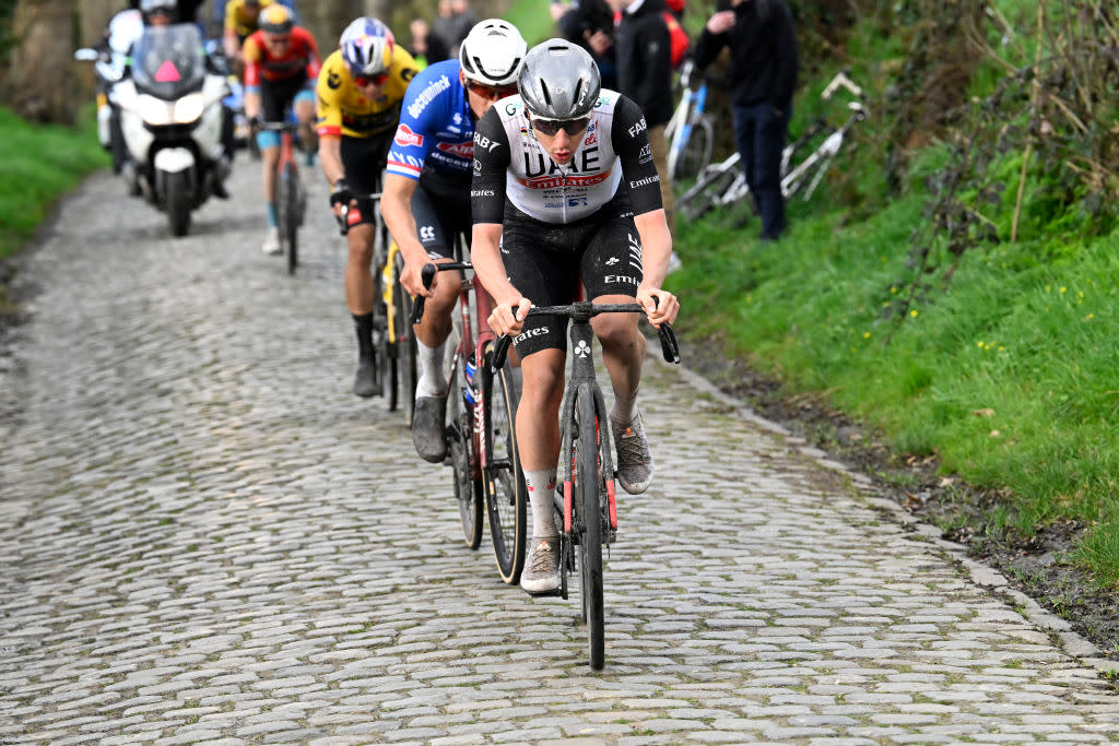  HARELBEKE, BELGIUM - MARCH 24 : Pogacar Tadej (SVN) of UAE Team Emirates attacking on Kwaremont during the 66th Saxo Bank classic E3 Harelbeke UCI World Tour cycling race with start and finish in Harelbeke on March 24, 2023 in Harelbeke, Belgium, 24/03/2023 ( Motordriver Kenny Verfaillie & Photo by Nico Vereecken / Photo News
 