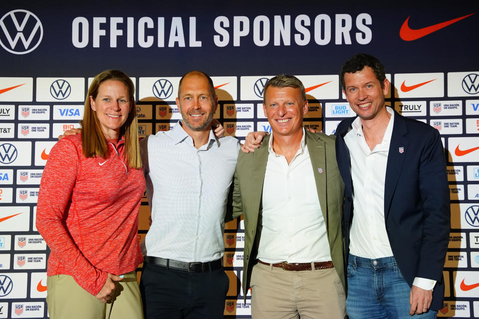 From left to right, United States Soccer president Cindy Parlow Cone, U.S. men’s national soccer team head coach Gregg Berhalter, U.S. Soccer sporting director Matt Crocker, and U.S. Soccer CEO JT Batson pose for a photo op during a news conference Friday, June 16, 2023, in Las Vegas. (AP Photo/Lucas Peltier)