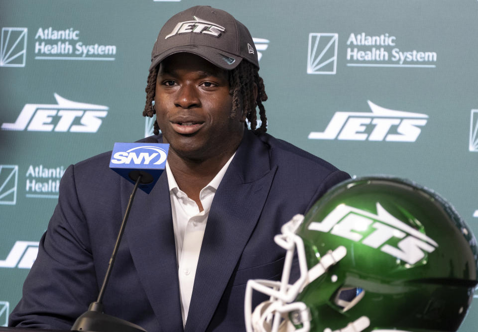 New York Jets offensive tackle Olu Fashanu addresses members of the media at the team's training facility in Florham Park, N.J. Friday, April 26, 2024. Fashanu, a Penn State offensive tackle, was selected at No. 11 overall by New York after the Jets traded down one spot Thursday night. (AP Photo/Craig Ruttle)