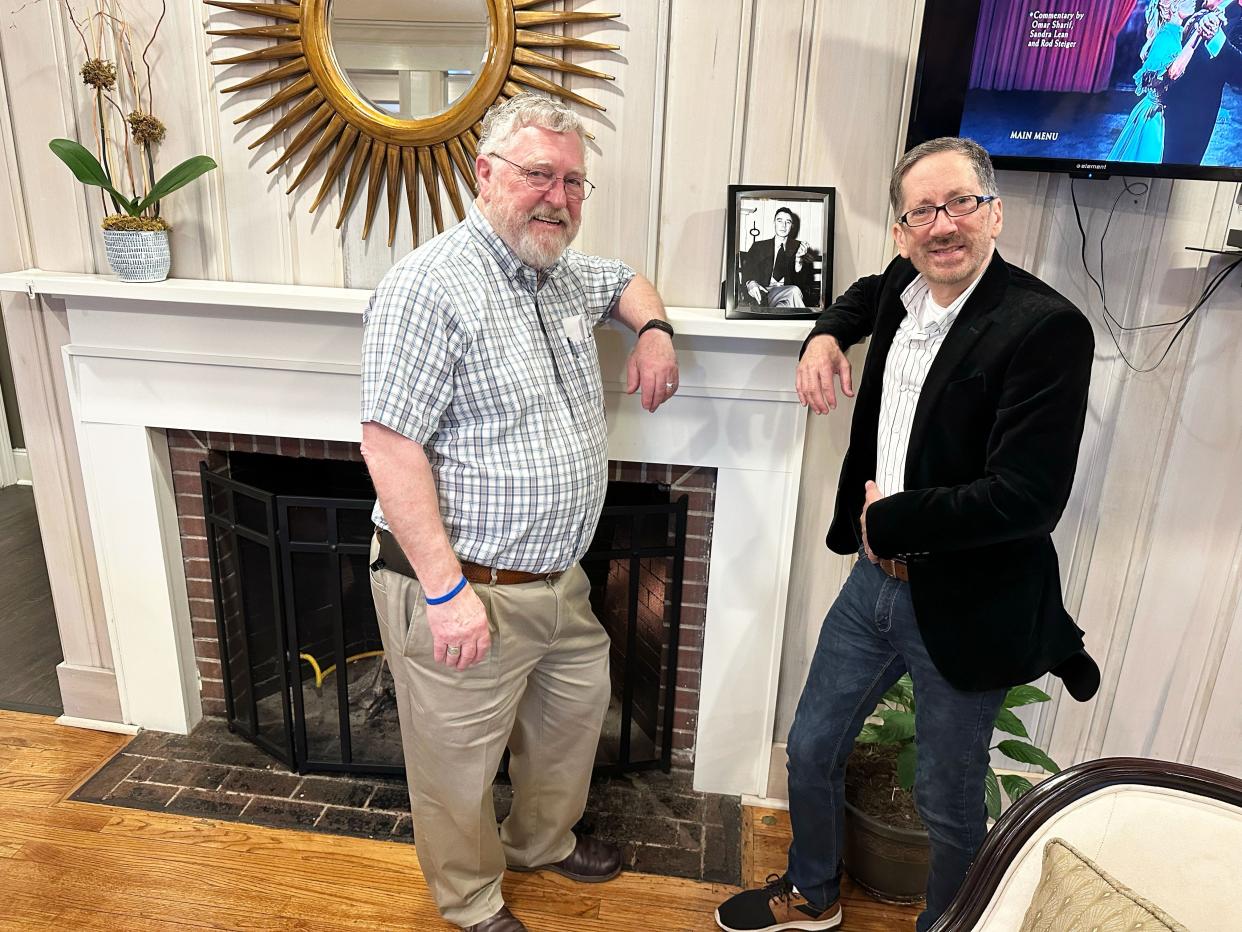 Trent Di Giulio, right, and Oak Ridge City Historian D. Ray Smith with the iconic photo of Robert Oppenheimer made by Ed Westcott. Trent is the director of a documentary on Oppenheimer.