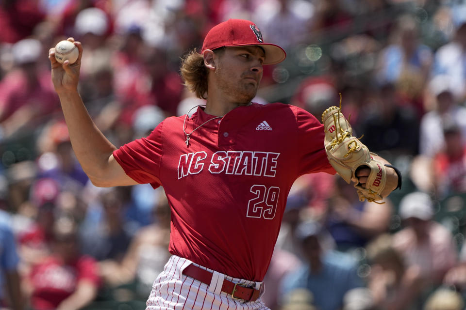 NC State pitcher Logan Whitaker throws against North Carolina during the first inning in an NCAA college baseball game at the Atlantic Coast Conference tournament final Sunday, May 29, 2022, in Charlotte, N.C. (AP Photo/Chris Carlson)