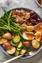 <p>According to food historians, the first Niçoise salad (from Nice, on <a href="https://www.delish.com/cooking/g2095/easy-french-recipes/" rel="nofollow noopener" target="_blank" data-ylk="slk:France’s;elm:context_link;itc:0;sec:content-canvas" class="link ">France’s</a> southeastern coast) contained only tomatoes, olive oil, and anchovies. Over the years, ingredients have been added and subtracted, so feel free to do the same and go with your favorites!<br><br>Get the <strong><a href="https://www.delish.com/cooking/recipe-ideas/a39564289/classic-nicoise-salad-recipe/" rel="nofollow noopener" target="_blank" data-ylk="slk:Niçoise Salad recipe;elm:context_link;itc:0;sec:content-canvas" class="link ">Niçoise Salad recipe</a></strong>.</p>
